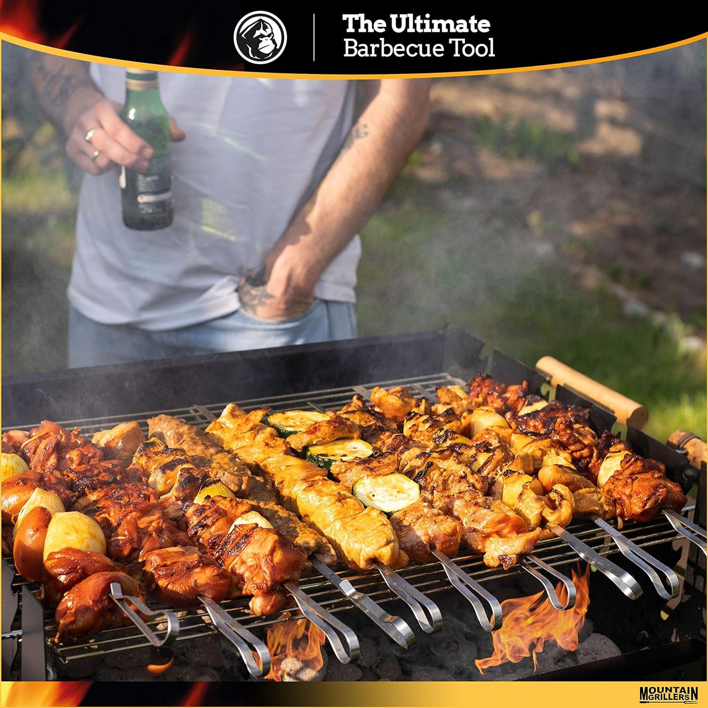 a man holding a bottle of beer over a grill full of food