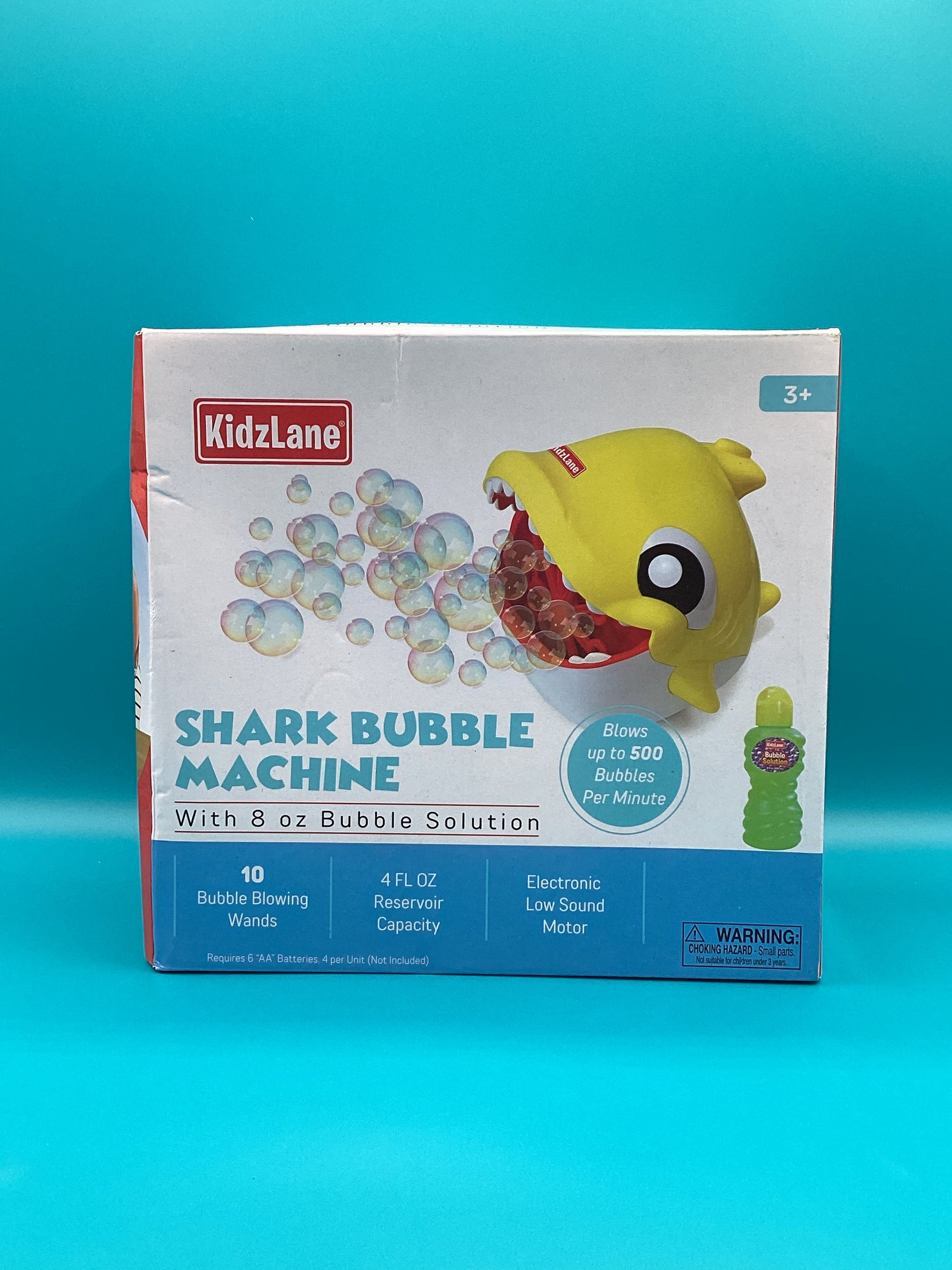 a box of kidzane shark bubble machine