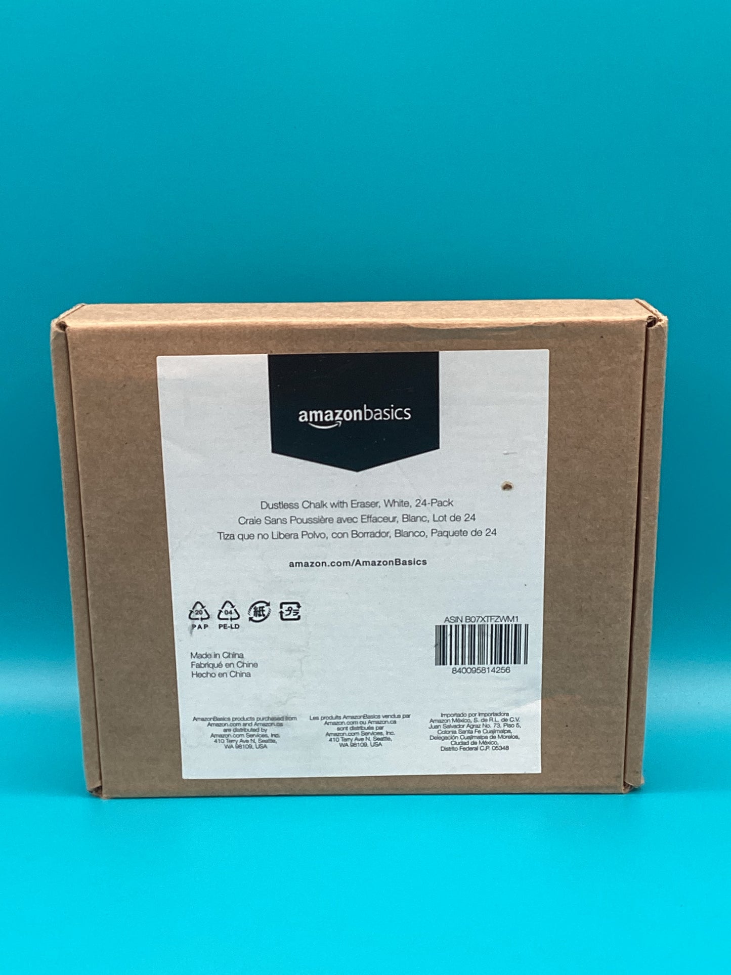 a box of amazonbasics on a blue background