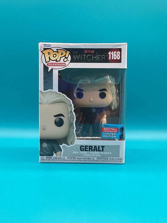 a pop vinyl figure in a box on a blue background